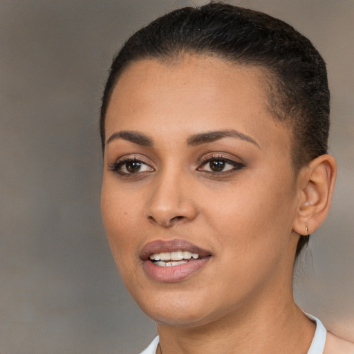 Joyful white young-adult female with short  brown hair and brown eyes