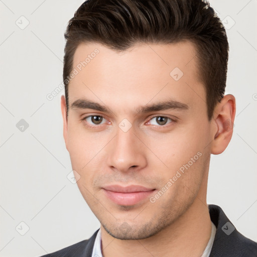 Neutral white young-adult male with short  brown hair and brown eyes