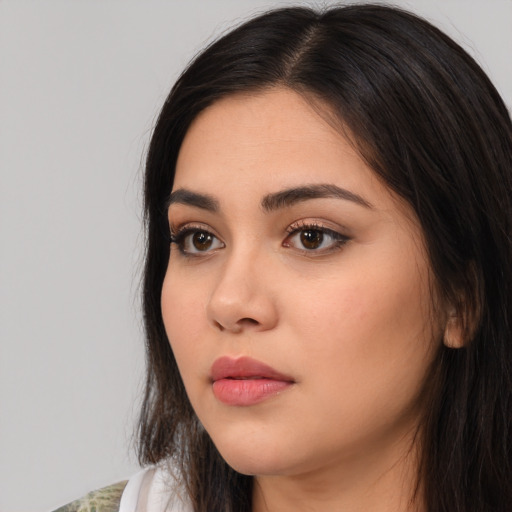 Neutral white young-adult female with long  black hair and brown eyes