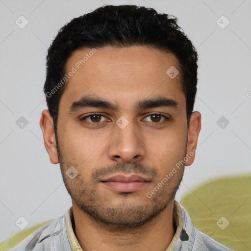 Neutral latino young-adult male with short  black hair and brown eyes
