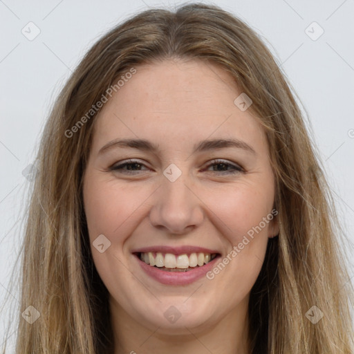 Joyful white young-adult female with long  brown hair and brown eyes