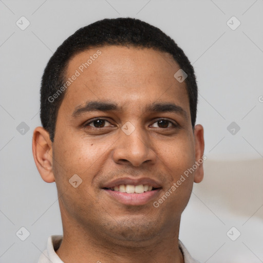 Joyful latino young-adult male with short  black hair and brown eyes