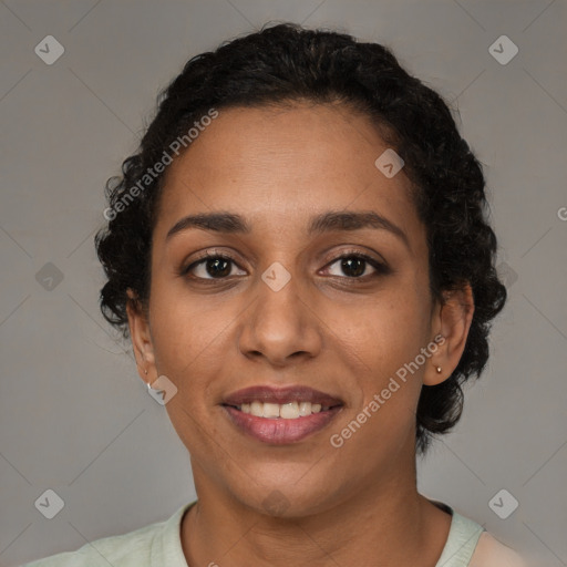 Joyful latino young-adult female with short  brown hair and brown eyes