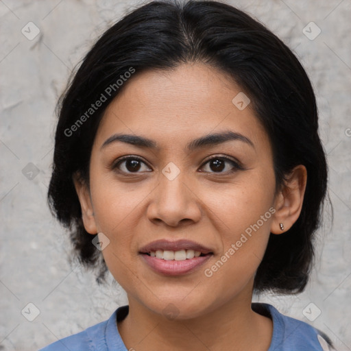 Joyful latino young-adult female with medium  black hair and brown eyes