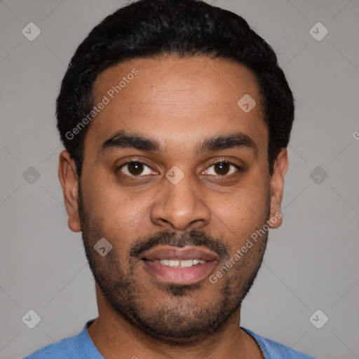 Joyful latino young-adult male with short  black hair and brown eyes