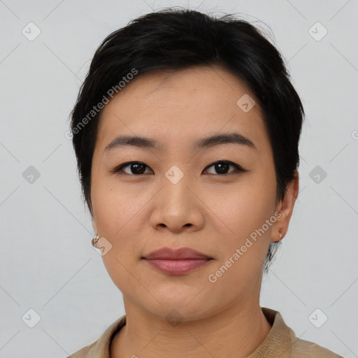 Joyful asian young-adult female with short  black hair and brown eyes