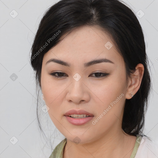 Joyful asian young-adult female with medium  brown hair and brown eyes