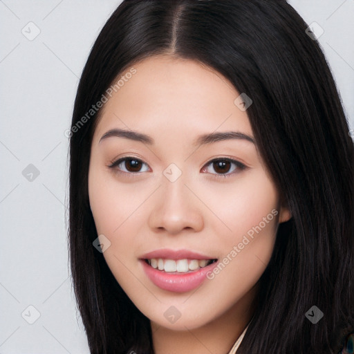 Joyful white young-adult female with long  black hair and brown eyes