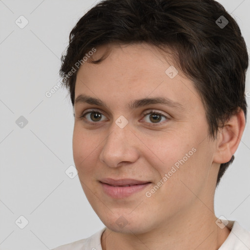 Joyful white young-adult female with short  brown hair and brown eyes