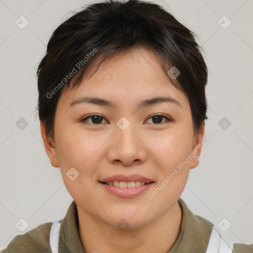 Joyful asian young-adult female with short  brown hair and brown eyes