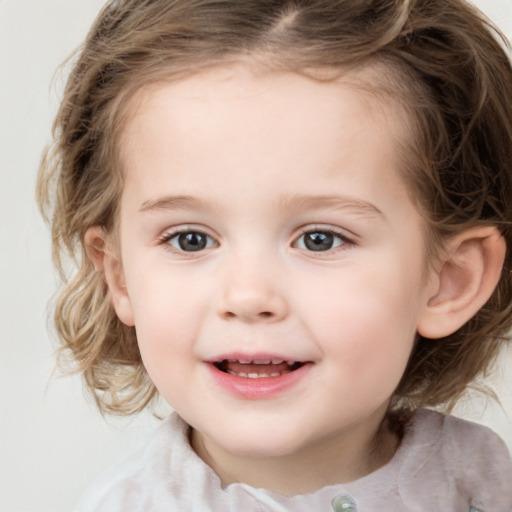 Joyful white child female with medium  brown hair and grey eyes