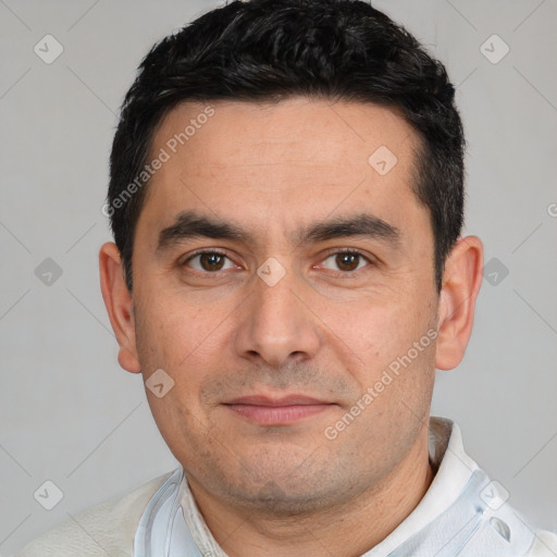 Joyful white young-adult male with short  black hair and brown eyes