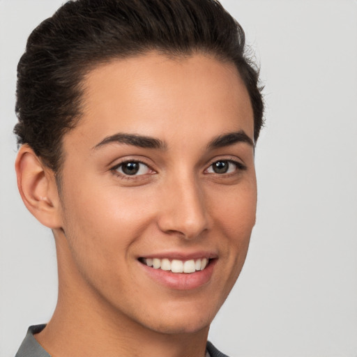 Joyful white young-adult female with short  brown hair and brown eyes