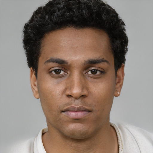 Neutral black young-adult male with short  black hair and brown eyes