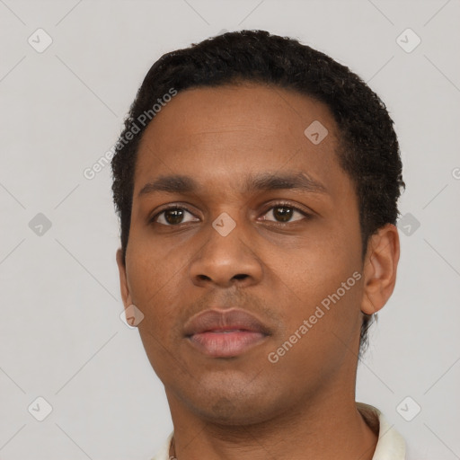 Neutral black young-adult male with short  black hair and brown eyes