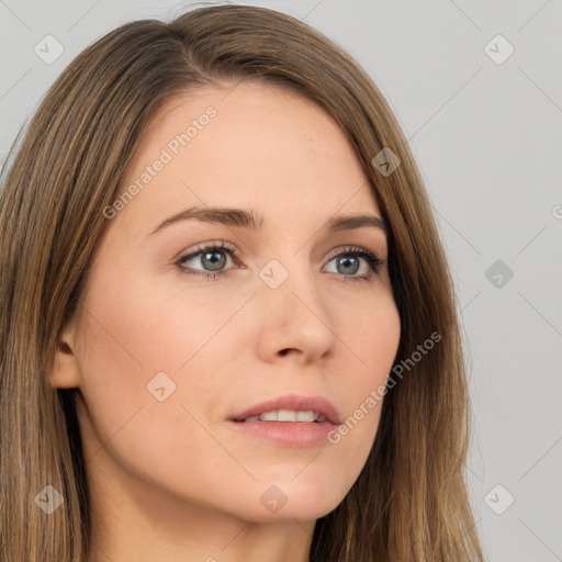 Neutral white young-adult female with long  brown hair and brown eyes