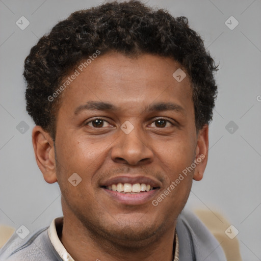 Joyful latino young-adult male with short  brown hair and brown eyes