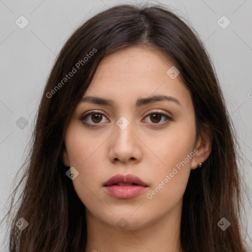 Neutral white young-adult female with long  brown hair and brown eyes