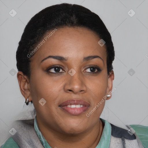 Joyful black young-adult female with short  brown hair and brown eyes