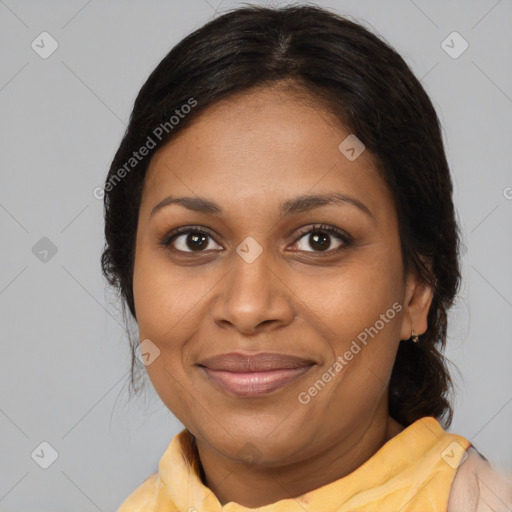 Joyful black young-adult female with medium  brown hair and brown eyes