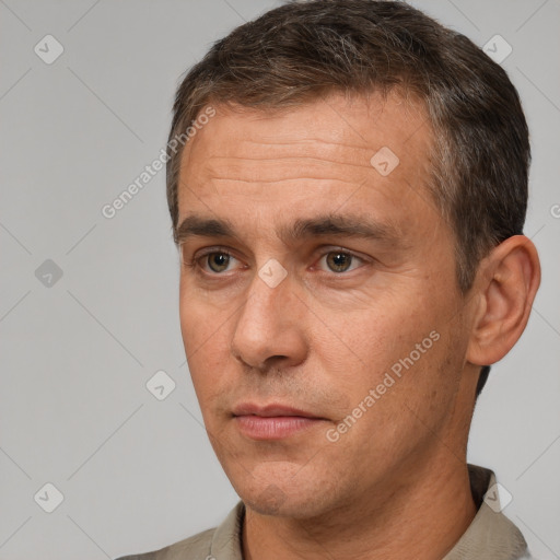 Neutral white adult male with short  brown hair and brown eyes