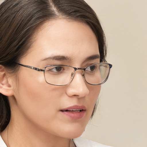 Neutral white young-adult female with medium  brown hair and brown eyes