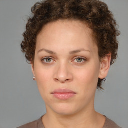 Neutral white young-adult female with short  brown hair and brown eyes