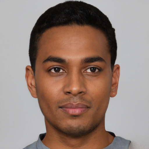 Neutral black young-adult male with short  black hair and brown eyes