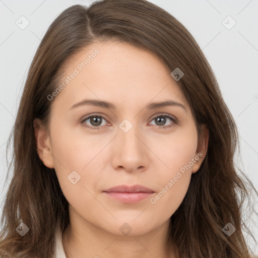 Neutral white young-adult female with long  brown hair and brown eyes