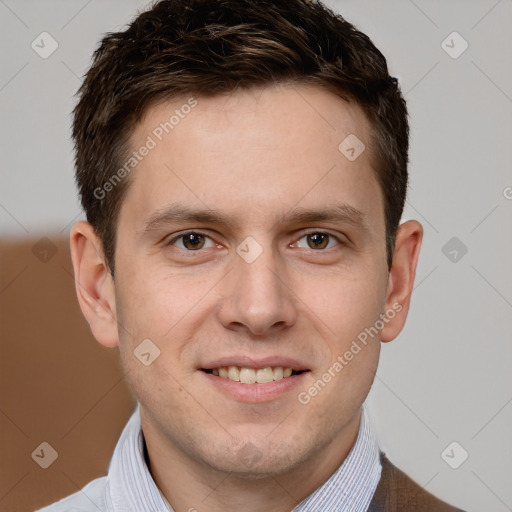 Joyful white young-adult male with short  brown hair and grey eyes