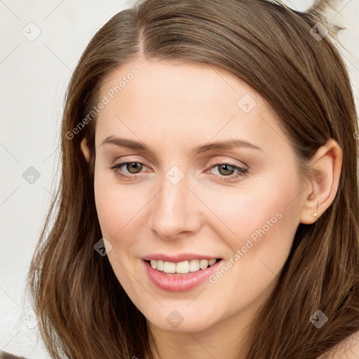 Joyful white young-adult female with long  brown hair and grey eyes