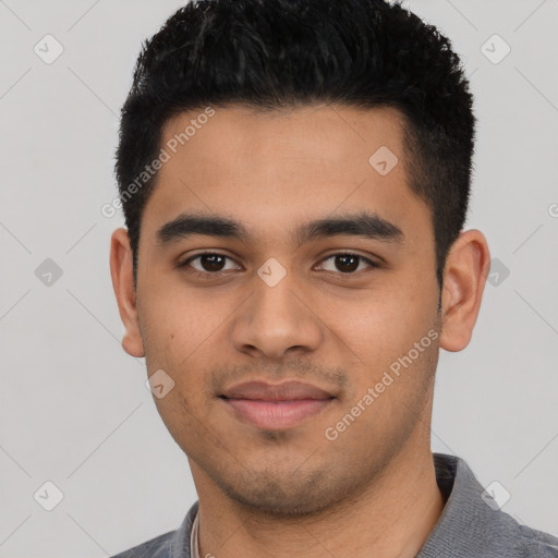 Joyful latino young-adult male with short  black hair and brown eyes