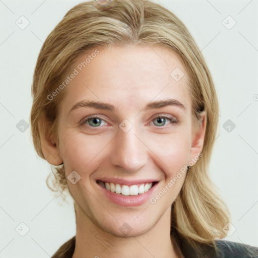 Joyful white young-adult female with medium  brown hair and blue eyes