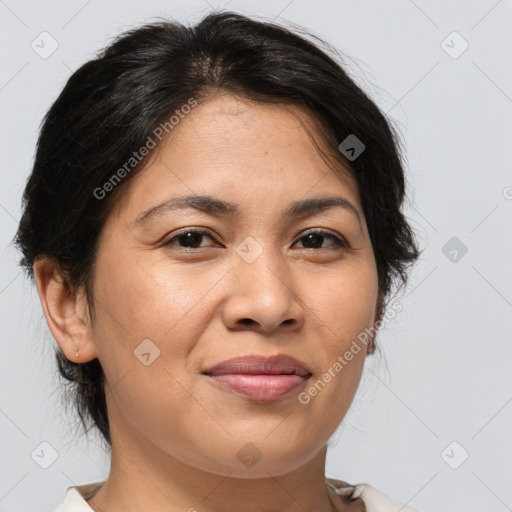 Joyful white adult female with medium  brown hair and brown eyes