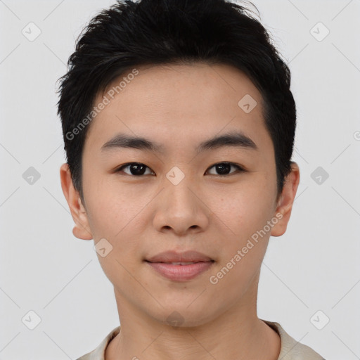 Joyful asian young-adult male with short  black hair and brown eyes