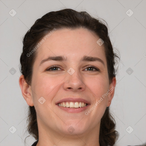 Joyful white young-adult female with medium  brown hair and grey eyes