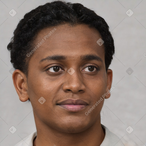 Joyful black young-adult female with short  brown hair and brown eyes