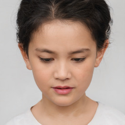 Joyful white child female with short  brown hair and brown eyes