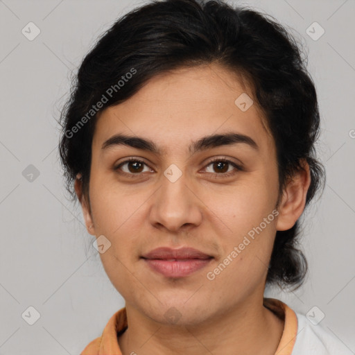 Joyful latino young-adult female with medium  brown hair and brown eyes