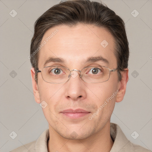 Joyful white adult male with short  brown hair and brown eyes