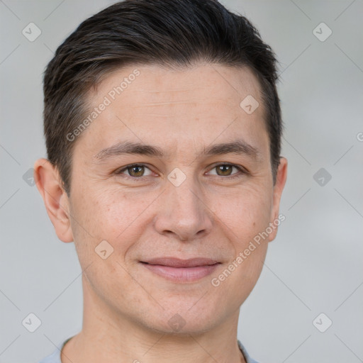 Joyful white adult male with short  brown hair and brown eyes