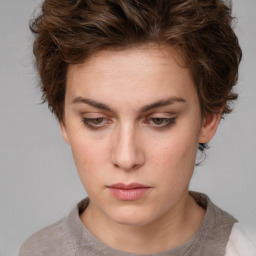 Neutral white young-adult female with short  brown hair and brown eyes