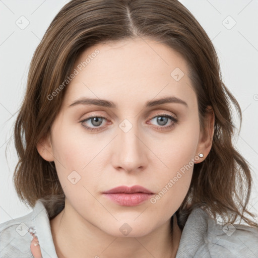 Neutral white young-adult female with medium  brown hair and grey eyes