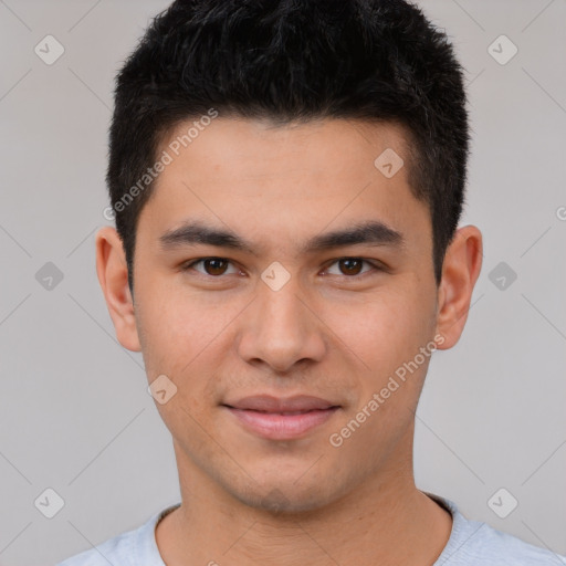 Joyful white young-adult male with short  black hair and brown eyes