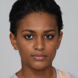 Neutral black young-adult female with short  brown hair and brown eyes