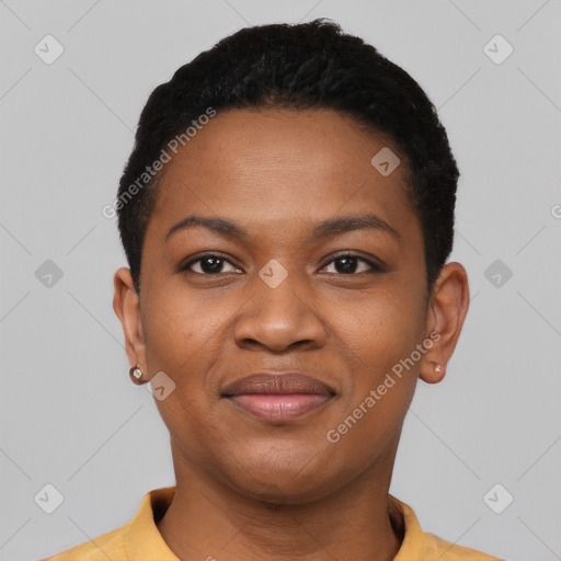 Joyful black young-adult female with short  black hair and brown eyes