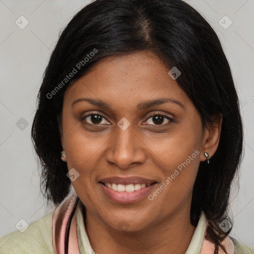 Joyful latino young-adult female with medium  brown hair and brown eyes