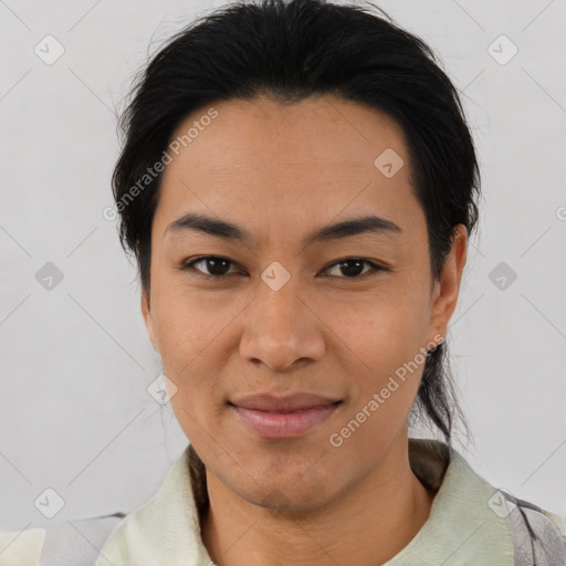 Joyful asian young-adult female with medium  black hair and brown eyes