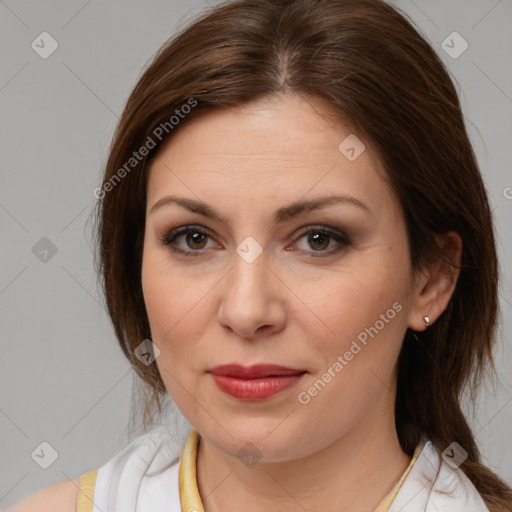 Joyful white young-adult female with medium  brown hair and brown eyes