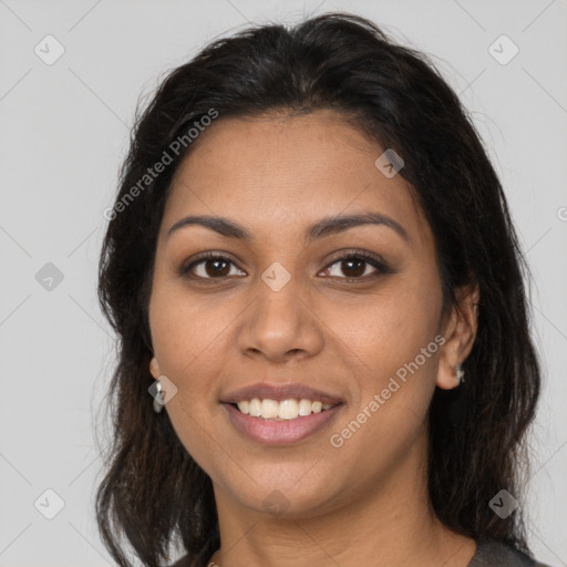 Joyful latino young-adult female with medium  brown hair and brown eyes